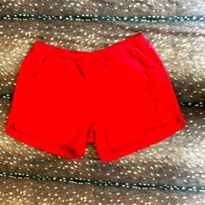 Red Reebok athletic shorts